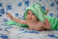 Little baby wrapped in a green towel Royalty Free Stock Photo