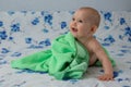 Little baby wrapped in a green towel Royalty Free Stock Photo