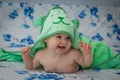 Little baby wrapped in a green towel Royalty Free Stock Photo