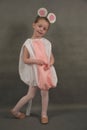 Little ballerina dressed as a mouse