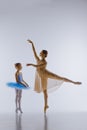 The little ballerina posing with personal teacher