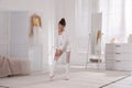 Little ballerina practicing dance moves at home Royalty Free Stock Photo