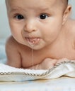 Little beautiful baby drools Royalty Free Stock Photo