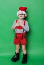 Little beautiful boy with Christmas gnome costume