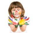 Little beautiful girl and paint Royalty Free Stock Photo