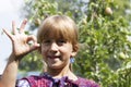 Little beautiful girl smiles in the park Royalty Free Stock Photo