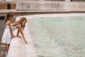 Little beautiful girls near fountain Fontana di Trevi Royalty Free Stock Photo