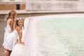 Little beautiful girls near fountain Fontana di Trevi Royalty Free Stock Photo