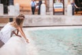 Little beautiful girls near fountain Fontana di Trevi Royalty Free Stock Photo