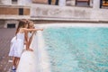 Little beautiful girls near fountain Fontana di Trevi Royalty Free Stock Photo