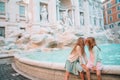 Little beautiful girls near fountain Fontana di Trevi Royalty Free Stock Photo