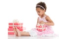 Little beautiful mulatto girl with a gift in their hands Royalty Free Stock Photo