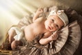 Little newborn girl with bandage on head Royalty Free Stock Photo