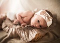 Little newborn girl with bandage on head Royalty Free Stock Photo