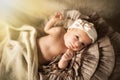 Little newborn girl with bandage on head Royalty Free Stock Photo