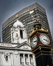 Little Ben Clock tower on Victoria Street and famous Victoria Palace Theatre in London, England Royalty Free Stock Photo