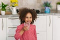 Little Black Girl is Holding a Glass of Drinking Water. the problem of finding clean drinking water