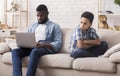 Little Black Son Offended To His Father Busy With Laptop