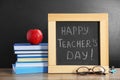 Little blackboard with inscription HAPPY TEACHER`S DAY Royalty Free Stock Photo