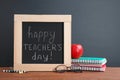 Little blackboard with inscription HAPPY TEACHER`S DAY Royalty Free Stock Photo