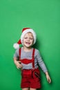 Little blond boy with Santa Claus cap smiling Royalty Free Stock Photo