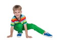 Little blond boy in a striped shirt Royalty Free Stock Photo