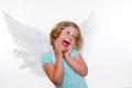 Little blond girl with angel- wings Royalty Free Stock Photo