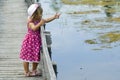 Little blond girl on boardwalk Royalty Free Stock Photo