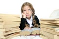 Little blond girl thinking with books