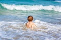 Little blond kid boy having fun on ocean beach in Florida Royalty Free Stock Photo