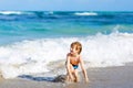 Little blond kid boy having fun on ocean beach in Florida Royalty Free Stock Photo