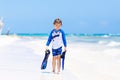 Little blond kid boy having fun on tropical beach of Boracay, Philippines Royalty Free Stock Photo