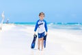 Little blond kid boy having fun on tropical beach of Haiti Royalty Free Stock Photo