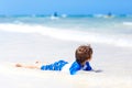 Little blond kid boy having fun on tropical beach of Seychelles Royalty Free Stock Photo