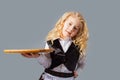 the little blond waitress holding a tray