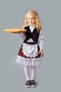 the little blond waitress holding a tray