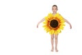 Little blonde girl hiding behind a flower. Beautiful little girl dressed in a flower dress