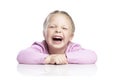 Little blonde girl in a pink sweater is laughing. Close-up. Isolated over white background