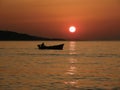 Little boat in summer sunset