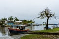 Little boat waiting on pier in Brazil on a rainy day Royalty Free Stock Photo