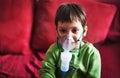 Little boy with aerosols inhaler Royalty Free Stock Photo