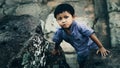 Little boy in Angkor Wat