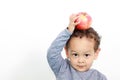 A little boy with apple on top of his head Royalty Free Stock Photo