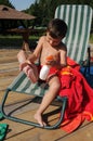 Little boy applying sunscreen lotion Royalty Free Stock Photo