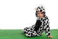 Little boy as happy cow in the meadows Royalty Free Stock Photo