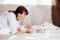 The little boy baby mother doing massage hands and legs Royalty Free Stock Photo