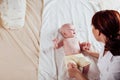 The little boy baby mother doing massage hands and legs Royalty Free Stock Photo