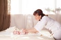 The little boy baby mother doing massage hands and legs Royalty Free Stock Photo