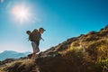 Little Boy backpacker traveler walk up on mountain top