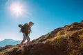 Little Boy backpacker traveler walking up on mountain top in High Tatra mountains